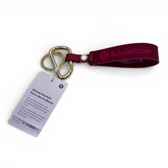 lululemon athletica Accessories - Lululemon NWT Silicone Keychain in Magenta with Gold Hardware OS